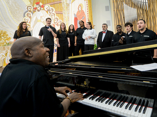 Students performing in the chapel