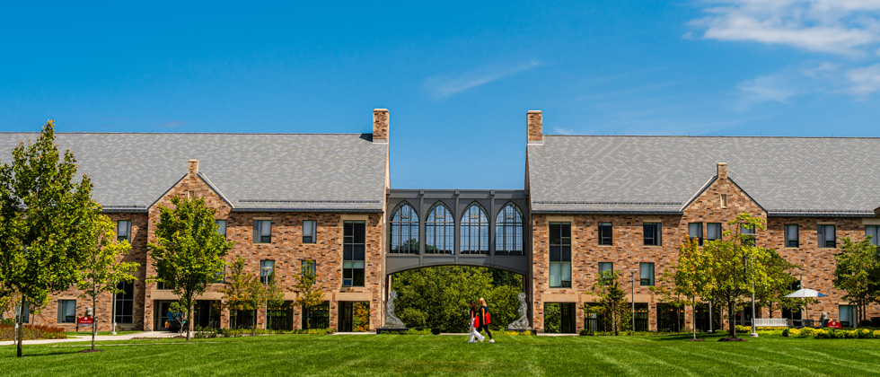 Dorm buildings connected by a pathway bridge
