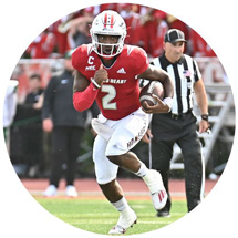 Football player running with ball
