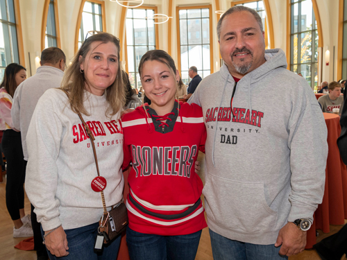 Student and parents at President's Breakfast
