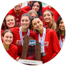 Women holding trophy
