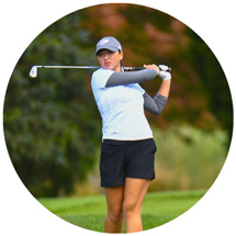 Woman golfing