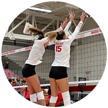 Women playing volleyball