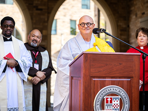 Two Catholic priests, a Buddhist monk and a Protestant pastor